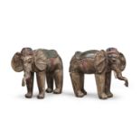 A PAIR OF INDIAN POLYCHROME LAQUER WOOD ELEPHANTS. EARLY 20TH CENTURY. DEFECTS