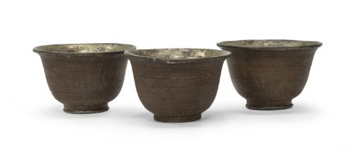 THREE WICKER AND METAL BOWLS FAR EAST 19TH CENTURY. DEFECTS.
