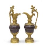 PAIR OF PORPHYRY AND BRONZE PITCHERS 19TH CENTURY