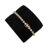 PINK GOLD TENNIS BRACELET WITH DIAMONDS