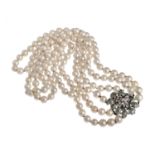 THREE-STRAND PEARL NECKLACE