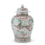 A CHINESE POLYCHROME ENAMELED PORCELAIN VASE WITH LID FIRST HALF 20TH CENTURY.