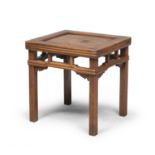 A MALAYSIAN WOOD LOW TABLE. 20TH CENTURY.