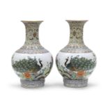 A PAIR OF CHINESE POLYCHROME ENAMELED PORCELAIN VASES 20TH CENTURY.