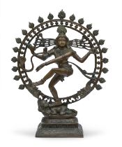 AN INDIAN BURNISHED BRONZE SCULPTURE DEPICTING SHIVA NATARAJA 20TH CENTURY.