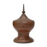 A RED LAQUER WOOD STUPA. PROBABLY BURMA 20TH CENTURY.