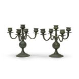 A PAIR OF SMALL INDIAN BRONZE CANDLESTICKS. EARLY 20TH CENTURY.