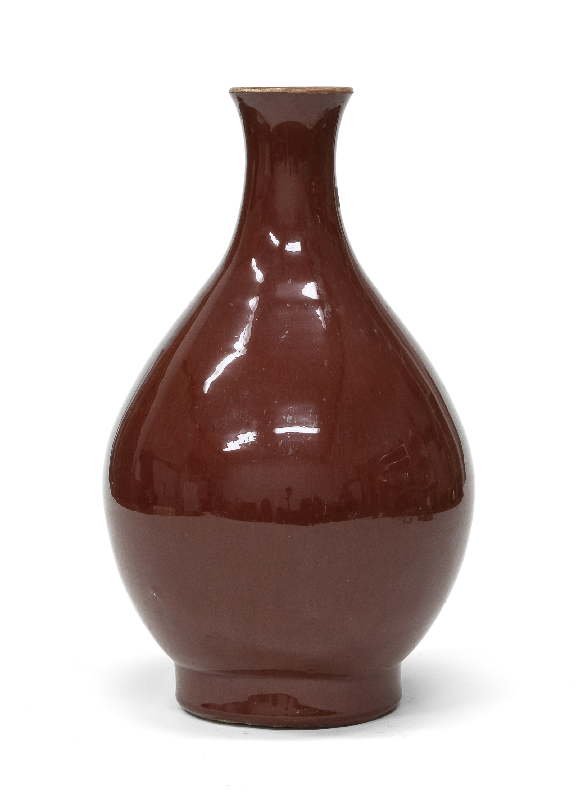 A CHINESE OXBLOOD CERAMIC VASE. 20TH CENTURY.