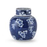 A CHINESE WHITE AND BLUE PORCELAIN JAR WITH LID EARLY 20TH CENTURY.