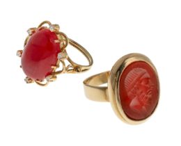 TWO GOLD RINGS WITH CORAL AND CARNELIAN
