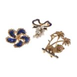 THREE GOLD BROOCHES WITH PEARLS LAPIS LAZULI RUBIES AND ENAMEL
