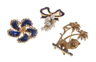 THREE GOLD BROOCHES WITH PEARLS LAPIS LAZULI RUBIES AND ENAMEL