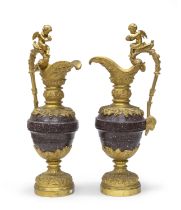 PAIR OF PORPHYRY AND BRONZE POURING PITCHERS 19TH CENTURY