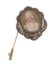 GOLD FANTASY BROOCH WITH MINIATURE