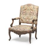 CARVED WALNUT ARMCHAIR PIEDMONT OR FRANCE 18TH CENTURY