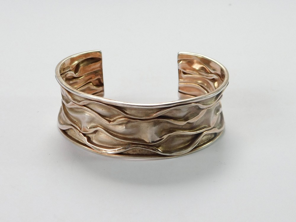 SILVER BANGLE.