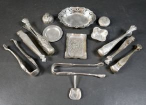 A collection of fourteen pieces of white metal/plated items, including seven sugar nips. (1 bag)