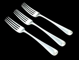 Three Georgian silver rat tail table forks, armorial crests to back of finials, rubbed hallmarks,