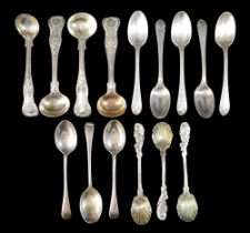 A collection of William IV and later spoons, including Kings pattern condiment spoons, one London