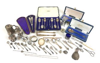 A mixed collection of silver items, including two 'Mayflower' commemorative spoons, a cased set of