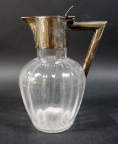 A silver topped claret jug, Birmingham 1907/08, 20cm high. Generally good condition.