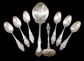 A collection of silver flatware, including a Lily pattern sauce ladle, Whiting Manufacturing