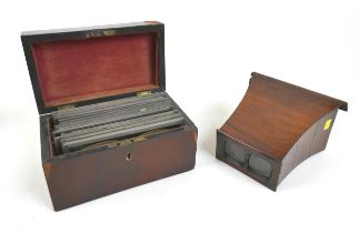 A collection of late 19th and early 20th century stereoscopic cards and glass slides, together