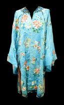 An early 20th century Japanese kimono, decorated with butterflies, chrysanthemums and other