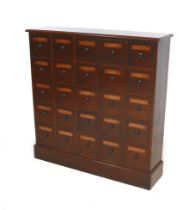 A modern mahogany carpenter made twenty five drawer chest, in the style of a Victorian