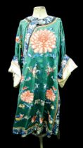 An early 20th century Japanese silk kimono, decorated with chrysanthemums, roses and butterflies