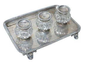 A George IV silver inkstand, with presentation inscription 'In Scholis philosophicis optime inter
