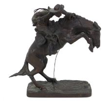 A Franklin Mint bronze resin sculpture, 'Broncho Buster', after Frederic Remington, 16 by 5 by