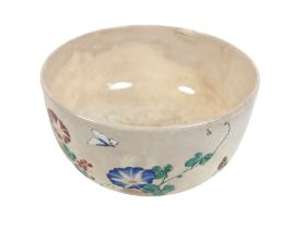 A Japanese Satsuma pottery bowl, Meiji period, decorated inside with goldfish, to the outside with