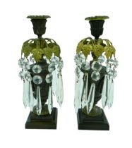 A pair of continental bronze table lustres, of urn form with gilt metal mounts, glass drops,