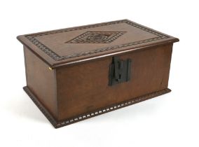 A carved oak bible box, purchased from the Christie's 1984 Benton House sale, 53 by 34 by 24cm high.