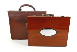 An unusual bespoke mahogany briefcase, silver mounted fittings, horn handle, oval plaque with