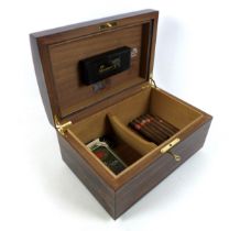 An exotic wood humidor, with key, 35 by 23 by 18cm high, containing four J. Cano Selectos sealed