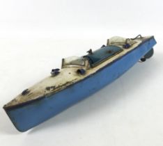 A Hornby Meccano tinplate clockwork speedboat RACER lll, apparently the gearing on the RACER lll was