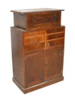 An early 20th century mahogany multi drawer cabinet, with an associated three drawer top, 76 by 43
