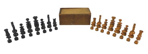 A late 19th century ebony and boxwood weighted chess set, King and Queen both 9cm high. Most
