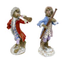 Two 19th century Meissen figurines, modelled as a trumpeter and an oboist from the Monkey Band
