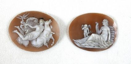 Two 19th century cameos, each oval carved with a classical nude lady, one rising a hippocampus,