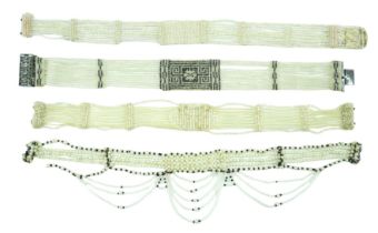 Four early 20th century chokers, comprising one with a white metal clasp inlaid with marcasites,