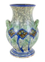 A Swedish Arts and Crafts Upsala Ekeby vase, with twin handles, decorated in greens and blues,