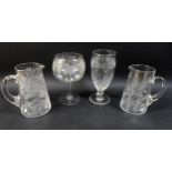 A group of four clear glass 19th century presentation vases / goblets, comprising one tall clear