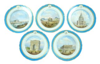 Five 19th century French hand painted plates with depictions of Paris, including the Arc de Triomph,