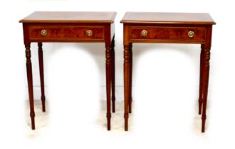 A new pair of walnut lamp tables, each with single frieze drawer and ring handles, raised on