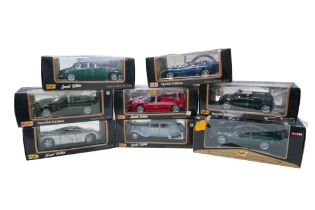 Eight Maisto 1:18 scale special edition die-cast model cars, including a 'Premier Edition Aston