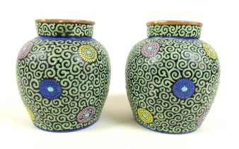 A pair of Chinese porcelain ginger jars and covers, mid 20th century, decorated with scrolling