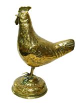 An embossed brass Cockerel on stand, with lift off head, 20cm by 32cm high. Provenance: Privately